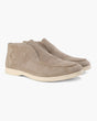 Ankle-height slip-on loafers with rounded toes, stitched apron detailing and flat contrasting soles