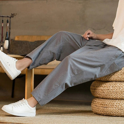 Men's relaxed tapered ankle trousers with drawstring waist and side pockets