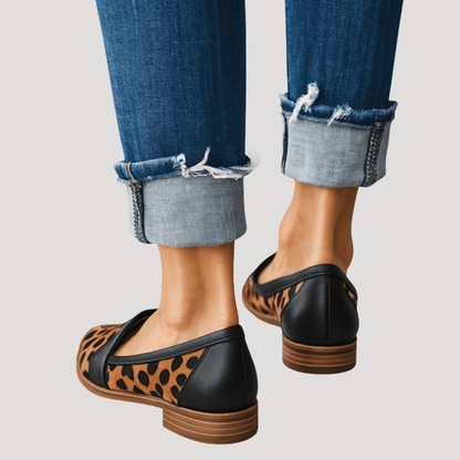 Women's penny loafers with almond toes, low heels and vamp straps