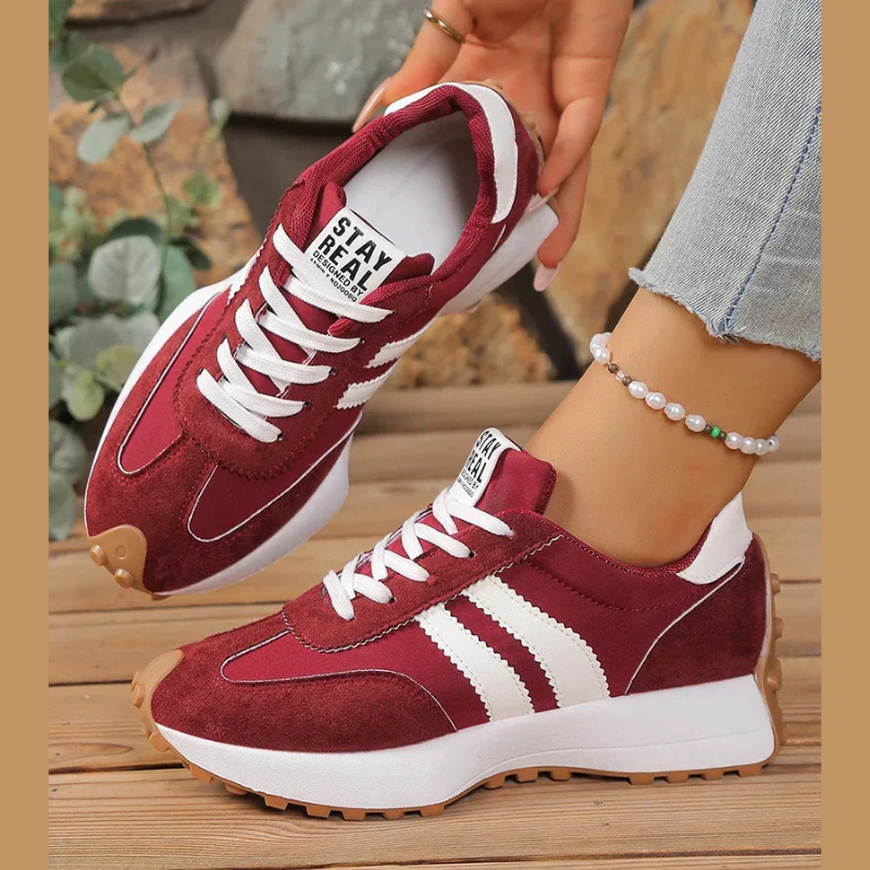 Women's retro lace-up sneakers with striped side panels and flat textured soles