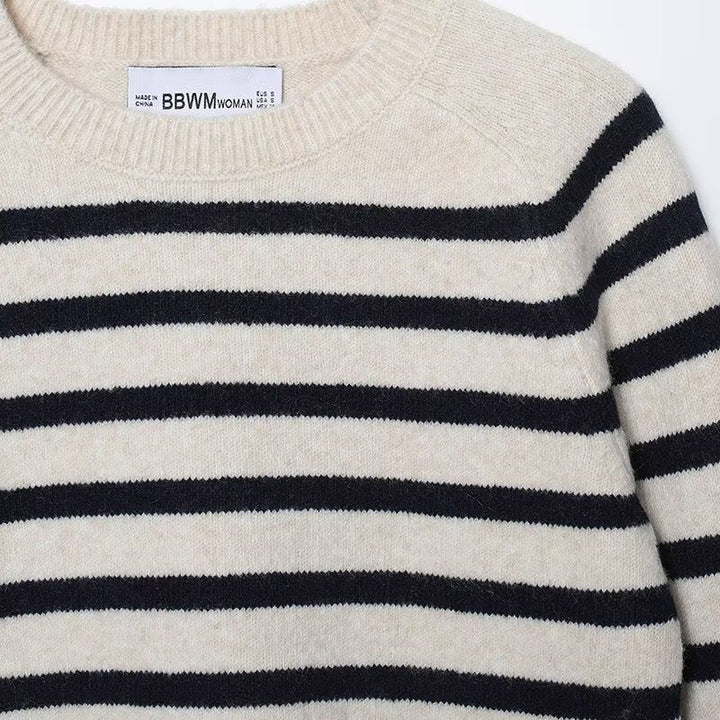 Women's cream and navy striped knit sweater with crew neck and long sleeves