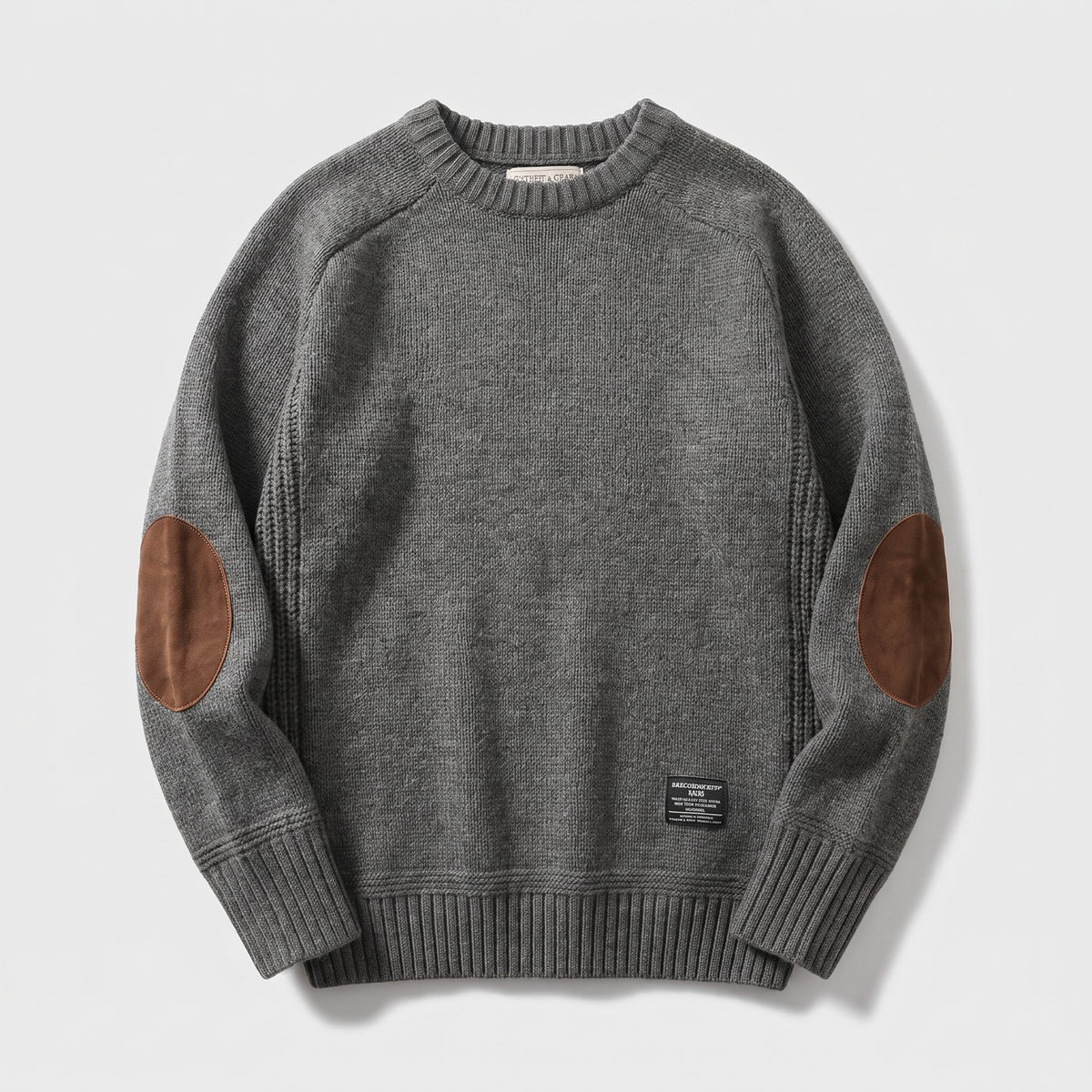 Textured crew neck knit sweater with contrasting elbow patches