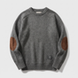 Textured crew neck knit sweater with contrasting elbow patches