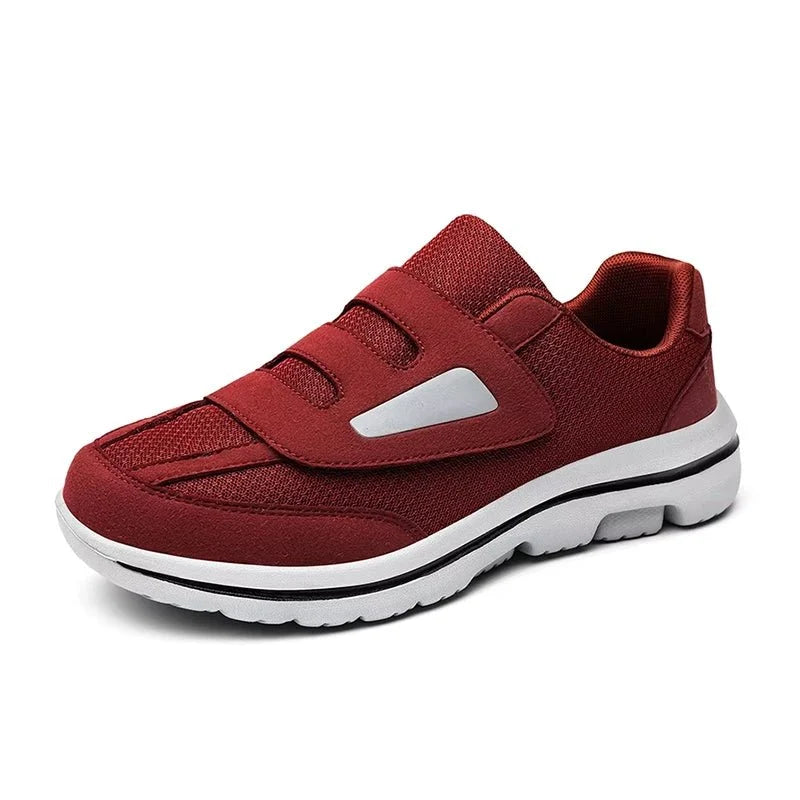 Women's wide toe slip-on sneakers with hook-and-loop straps and layered soles