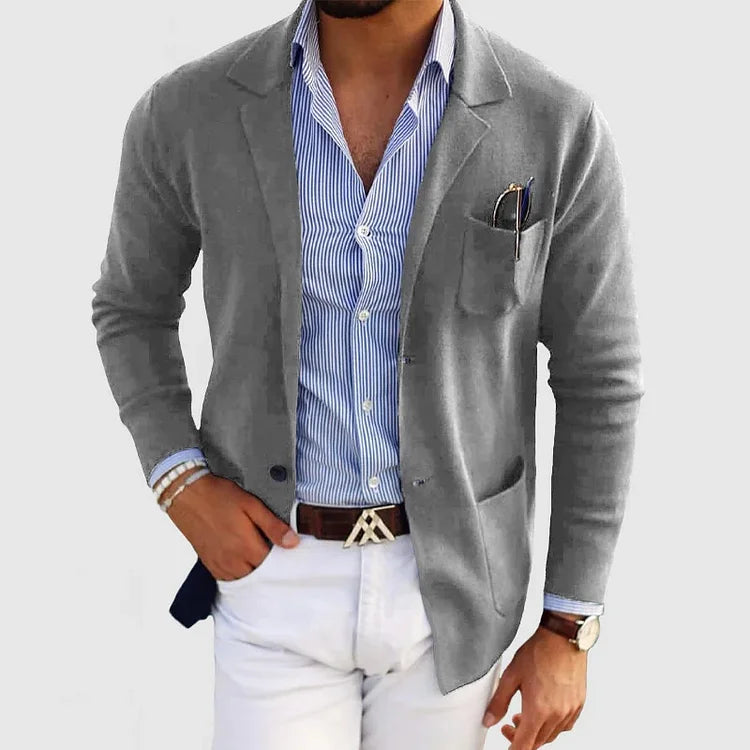 Men's solid blazer with notched lapels, long sleeves, buttons and front pockets