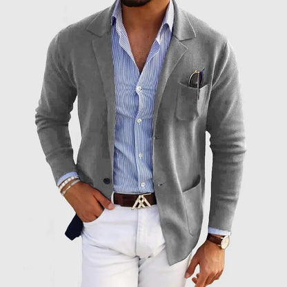 Men's solid blazer with notched lapels, long sleeves, buttons and front pockets