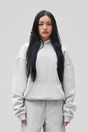 Women's grey pullover hoodie with hood, long sleeves and kangaroo pocket