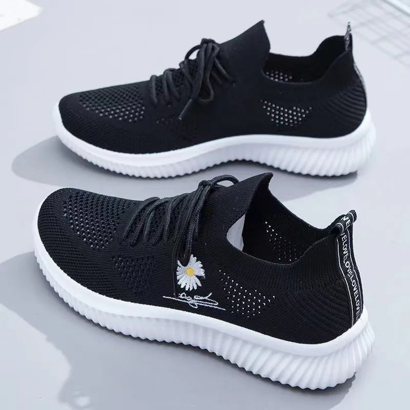 Women's floral lace-up sneakers with ribbed soles