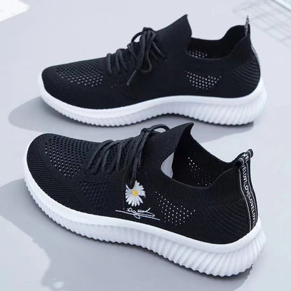 Women's floral lace-up sneakers with ribbed soles