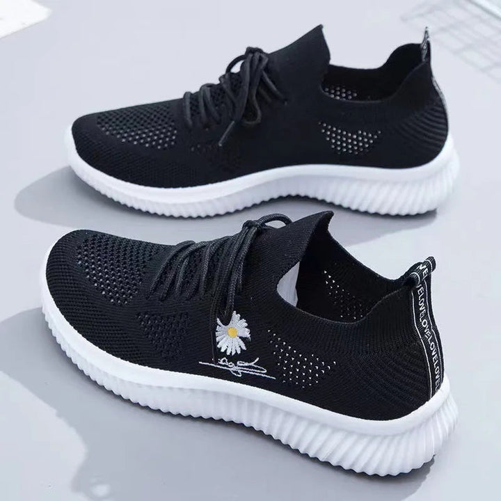 Women's floral lace-up sneakers with ribbed soles