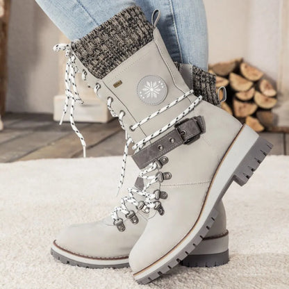 Women's lace-up ankle snow boots with knitted cuffs, buckle straps and ridged soles
