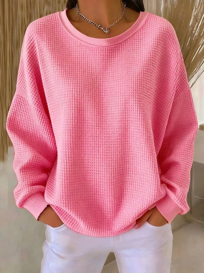 Women's textured crew neck sweater with long sleeves and ribbed trims