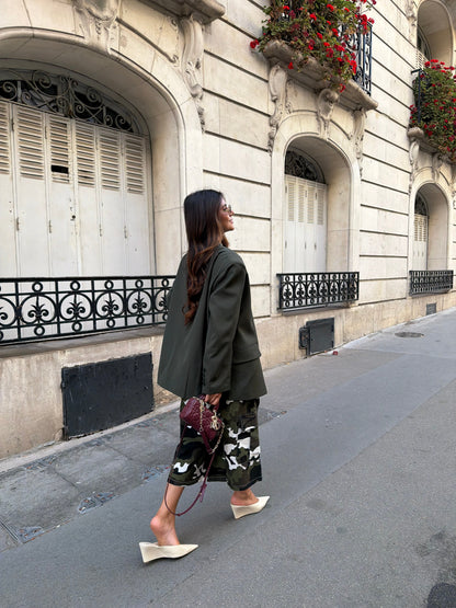 Women's deep green longline blazer with notched lapels and long sleeves