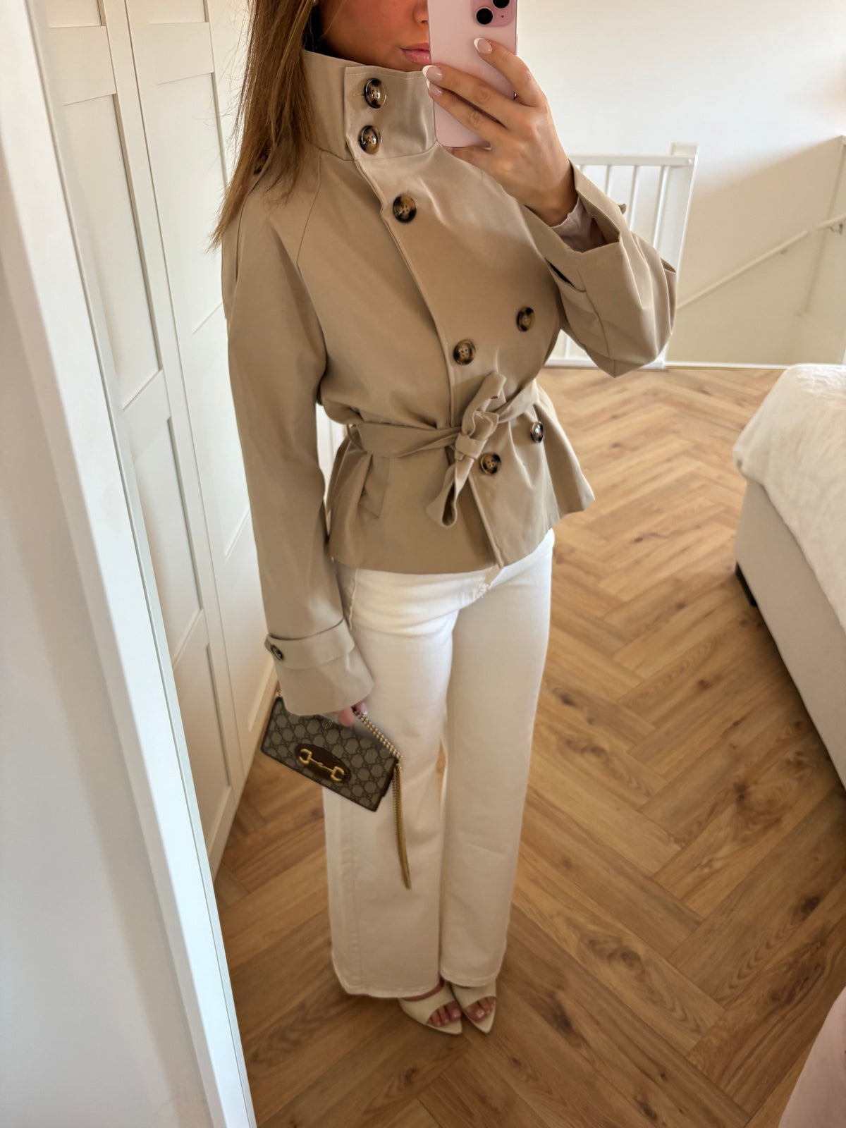 Women's beige cropped trench jacket with high collar and tie belt
