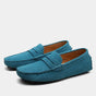 Pair of men's slip-on loafers with moc toe stitching and penny strap detail