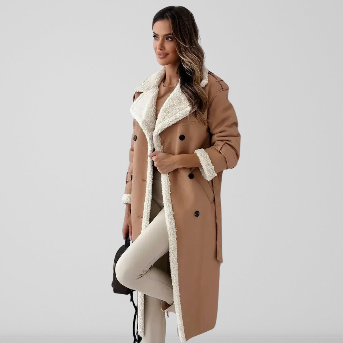 Women's long coat with contrasting shearling-style trim, lapel collar and double-breasted buttons