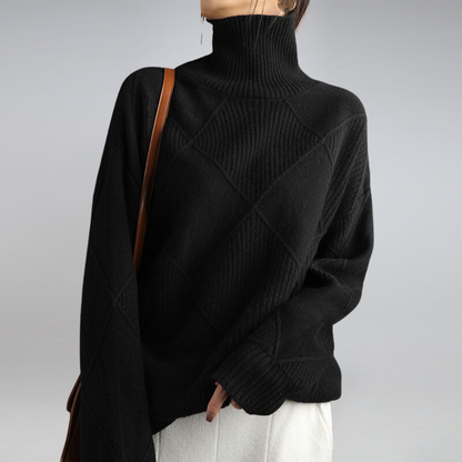 Women's geometric turtleneck sweater with long sleeves and ribbed panels