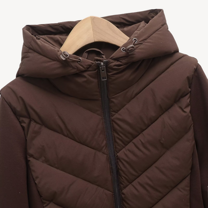 Women's hooded quilted jacket with chevron stitching and zip front