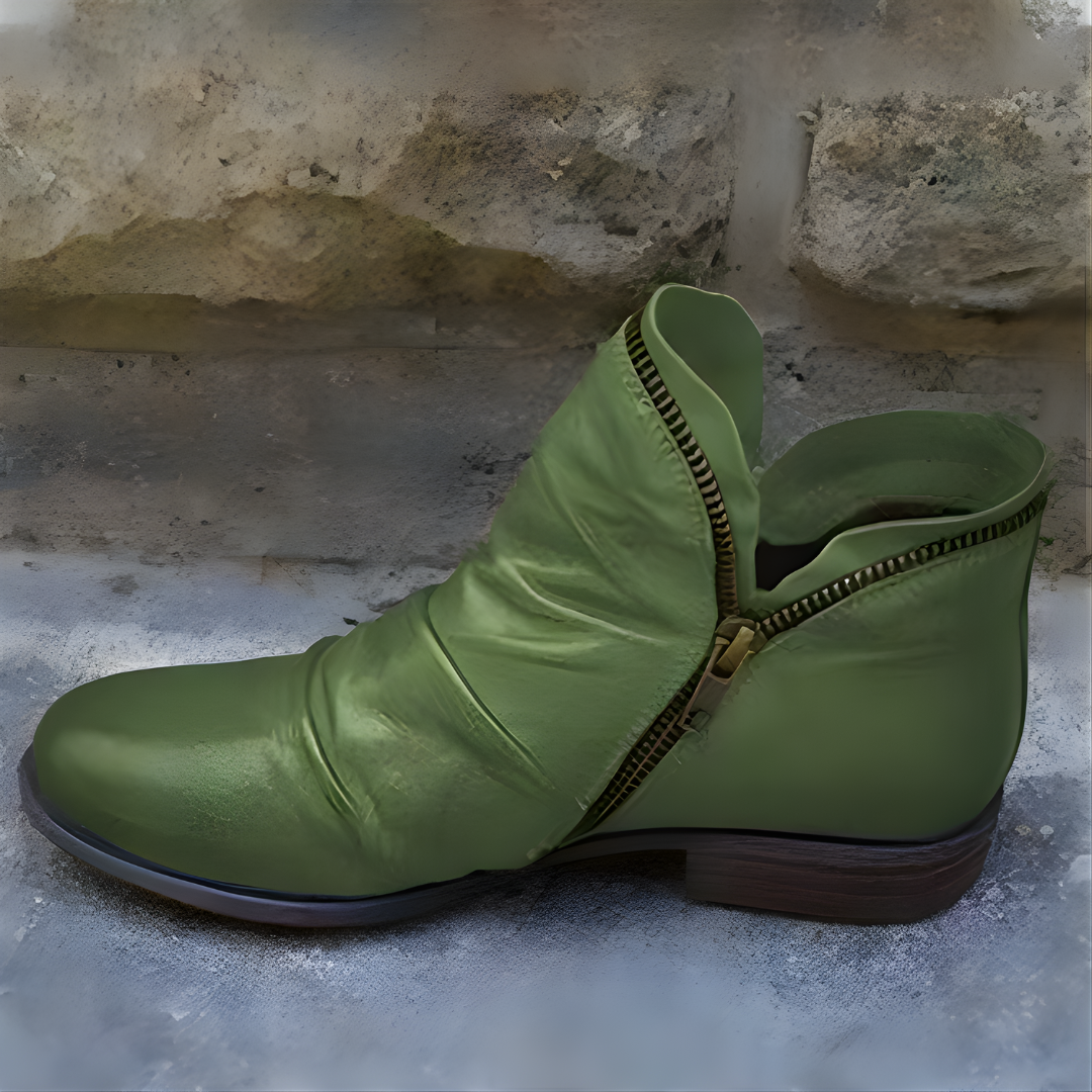 Ankle boots with diagonal zipper, rounded toe and low heel
