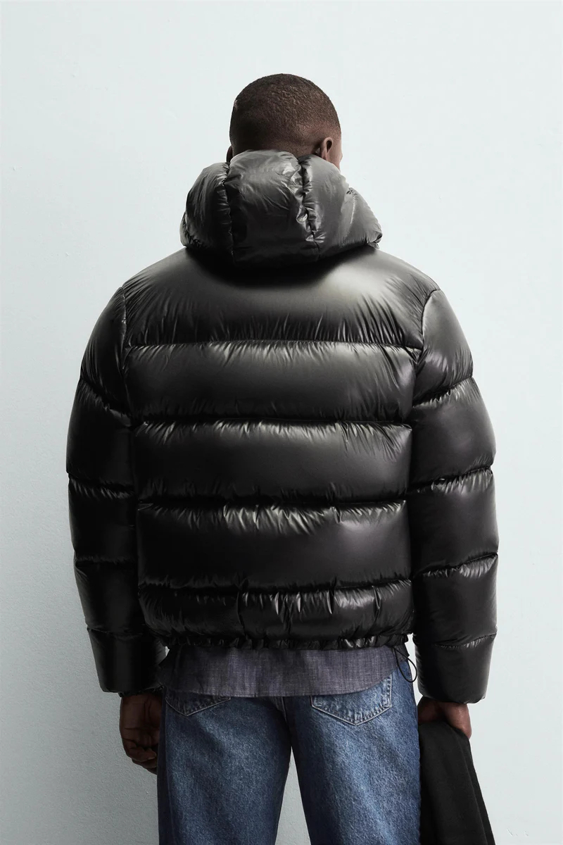 Men's quilted hooded puffer jacket with long sleeves and front zipper