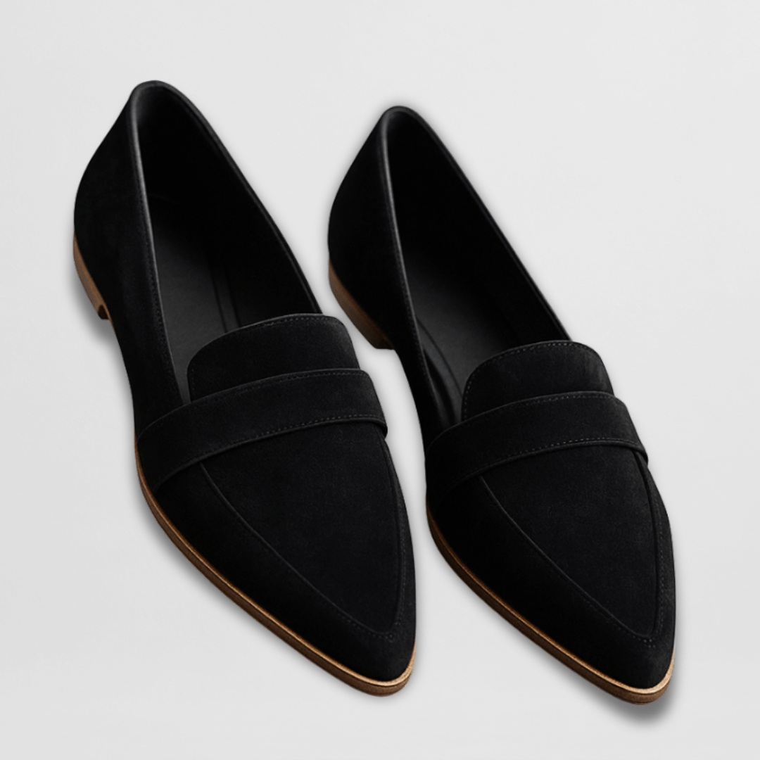 Women's pointed penny loafers with low heels and slip-on styling