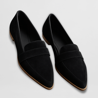 Women's pointed penny loafers with low heels and slip-on styling
