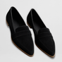 Women's pointed penny loafers with low heels and slip-on styling