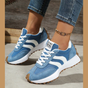 Women's retro lace-up sneakers with striped side panels and flat textured soles