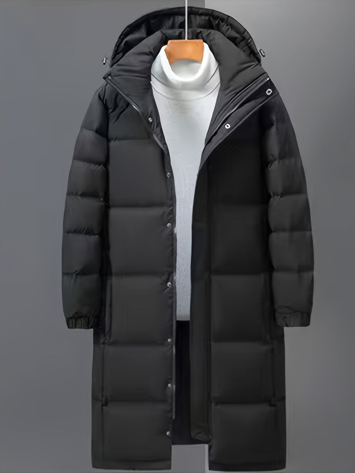 Men's black long hooded puffer coat with quilted panels and zip front
