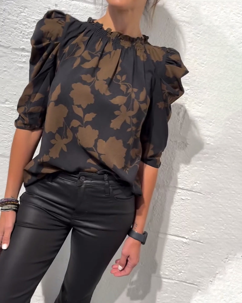 Women's floral blouse with ruched round neckline and 3/4 puff sleeves
