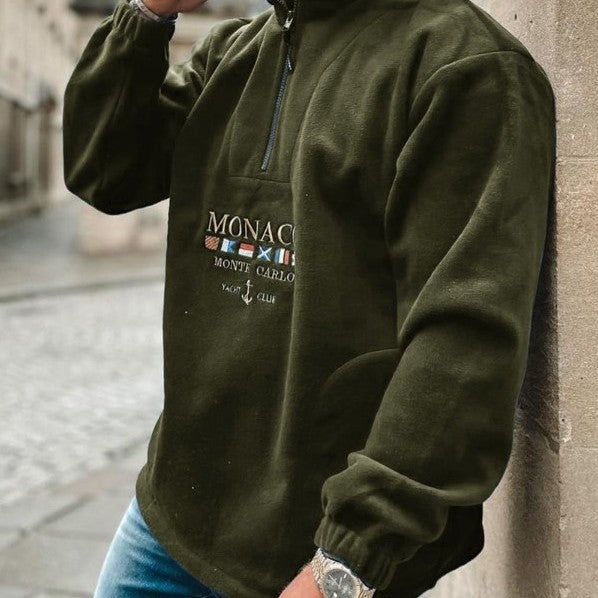 Men's quarter-zip mock neck sweater with graphic front and pouch pocket