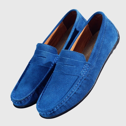 Classic slip-on loafers with penny strap and moc-toe stitching