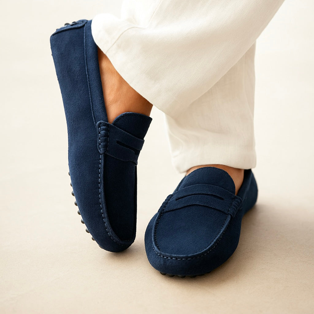 Suede boat loafers with moc stitching and penny-style straps