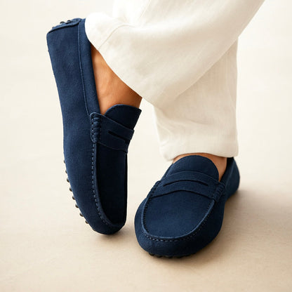 Suede boat loafers with moc stitching and penny-style straps