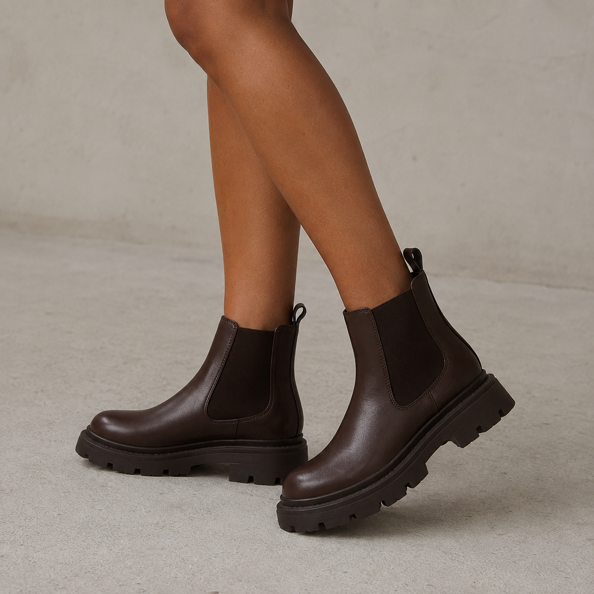 Chelsea boots with elastic side panels and chunky lug soles