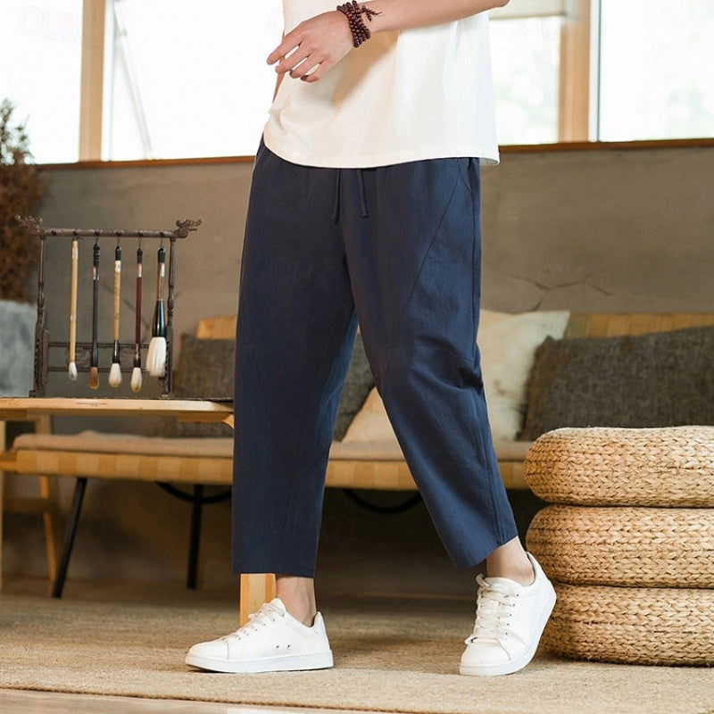 Men's relaxed tapered ankle trousers with drawstring waist and side pockets