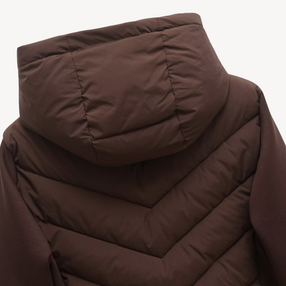 Women's hooded quilted jacket with chevron stitching and zip front