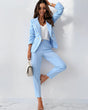 Women's double-breasted trouser suit with tailored blazer, lapels and matching ankle-length trousers