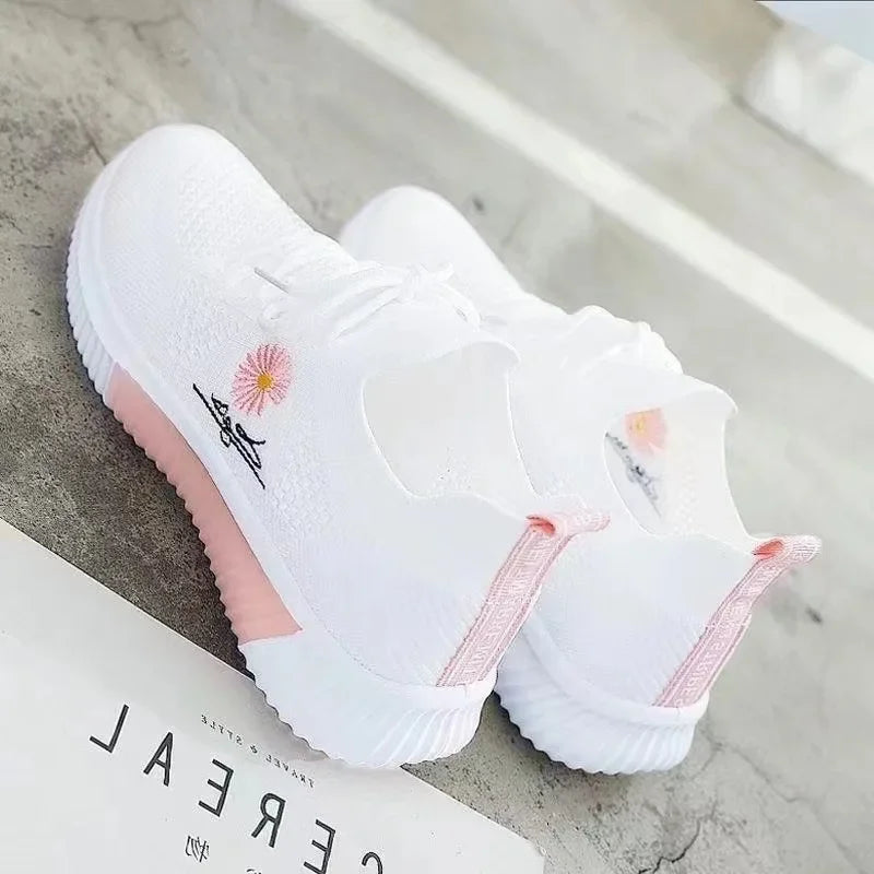 Women's floral lace-up sneakers with ribbed soles