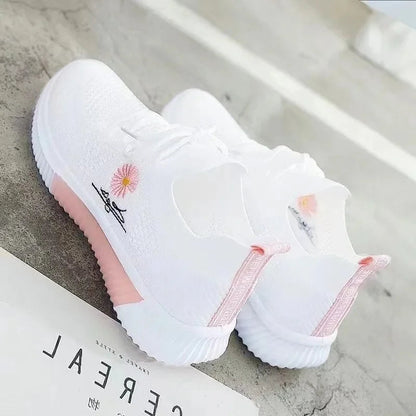 Women's floral lace-up sneakers with ribbed soles