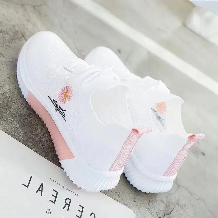 Women's floral lace-up sneakers with ribbed soles