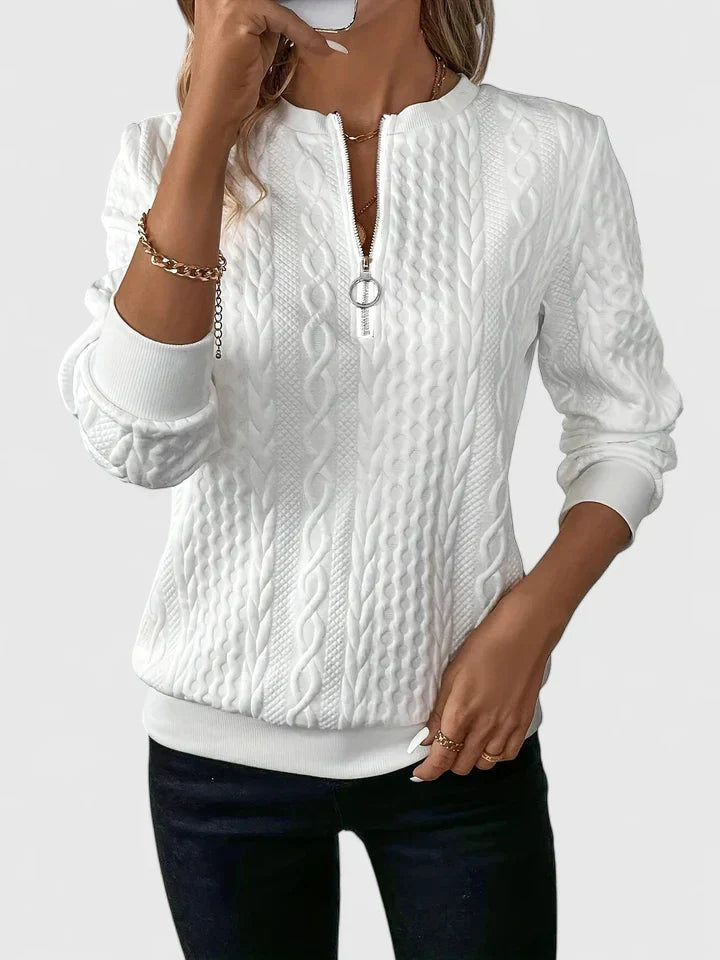 Women's textured cable knit sweater with zip neckline and ribbed trims