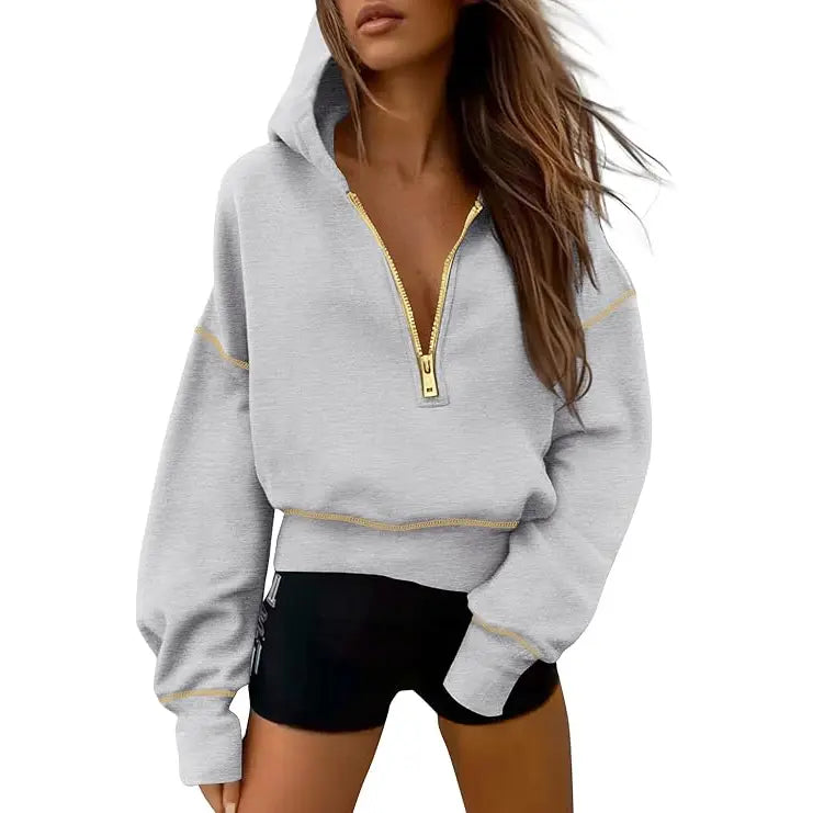 Women's cropped hooded sweatshirt with half zip and contrast stitching