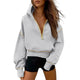 Women's cropped hooded sweatshirt with half zip and contrast stitching