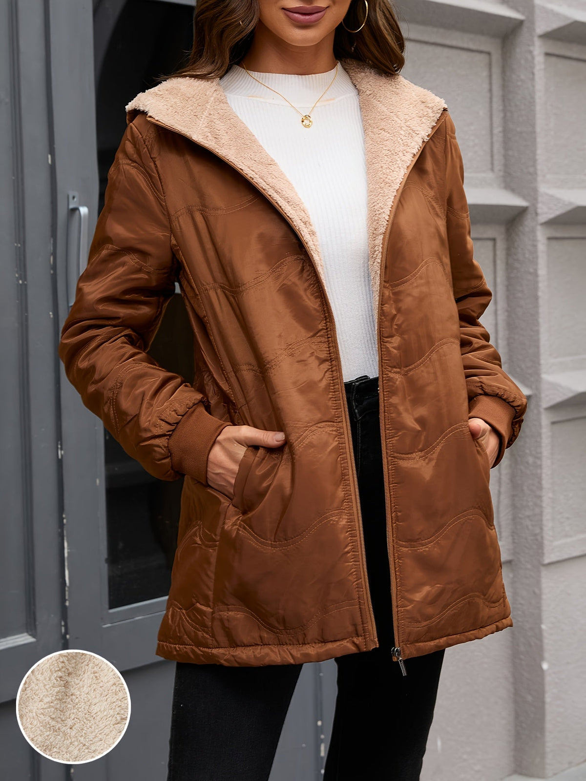 Women's long hooded quilted jacket with fleece-look lining and zip front