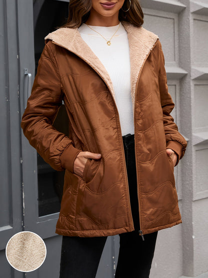 Women's long hooded quilted jacket with fleece-look lining and zip front