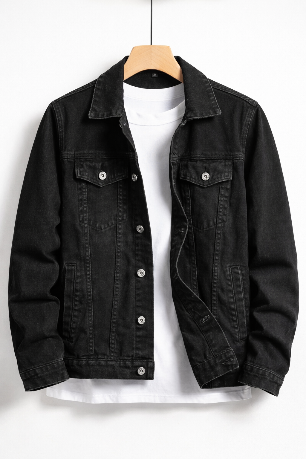 Men's black button-front denim jacket with chest flap pockets