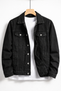 Men's black button-front denim jacket with chest flap pockets
