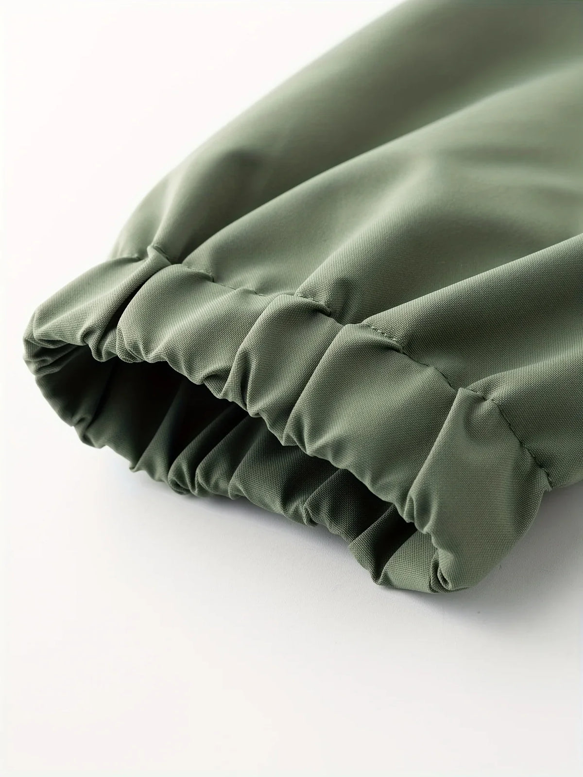 Men's black and green hooded jacket with yellow zips