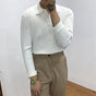 Men's long-sleeve ribbed polo sweater with collared neckline and button placket